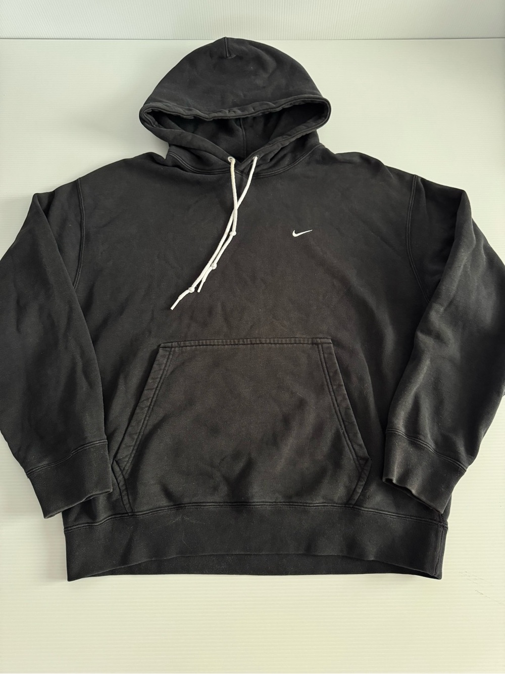 Nike Black Pullover Hoodie with White Swoosh